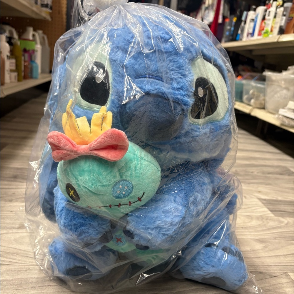 Blue Plush Toy with Red Bow
